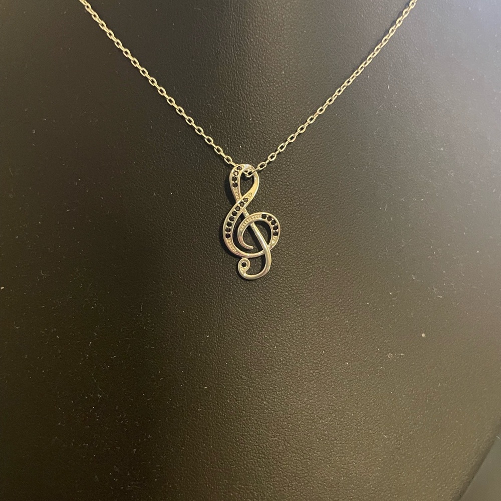 Elegant Silver Treble Clef Necklace